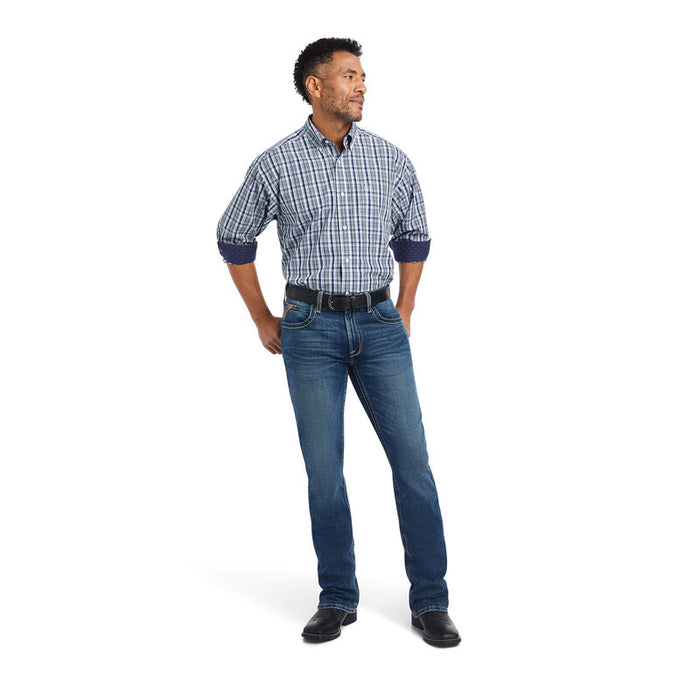 Men's Ariat long sleeve wrinkle free shirt in Airy Blue. Full front view showing shirt tucked in.