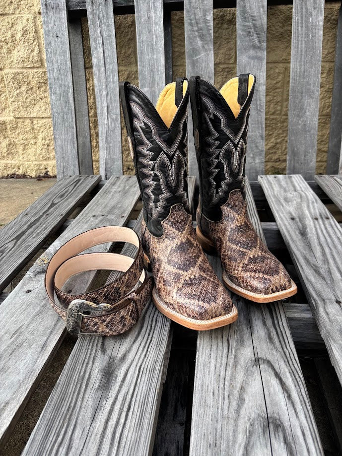 Men's square-toe boots with natural rattlesnake print leather on the vamp and a 12 inch Black leather shaft with a detailed stitch pattern. Front view showing boots and matching belt, sold separately.