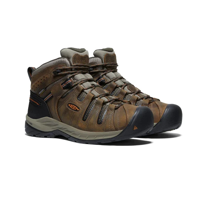 Men's Keen 6" Flint II Waterproof Mid boots in black olive and brindle colors, featuring a soft toe cap and a lace-up closure. Side View