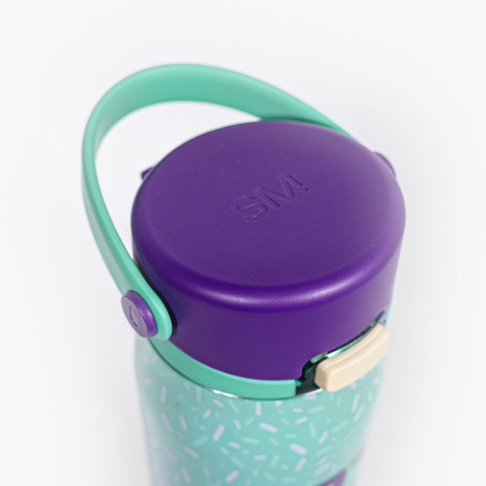 Adult model wearing multi-color water bottle with "Mesa Sport" design