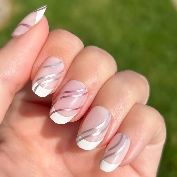 Metallic Linear French - Press-On | Short | Round false nails with white tips and curved metallic lines on natural nails