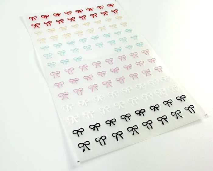Mini Bows nail decals, angled view of the sheet
