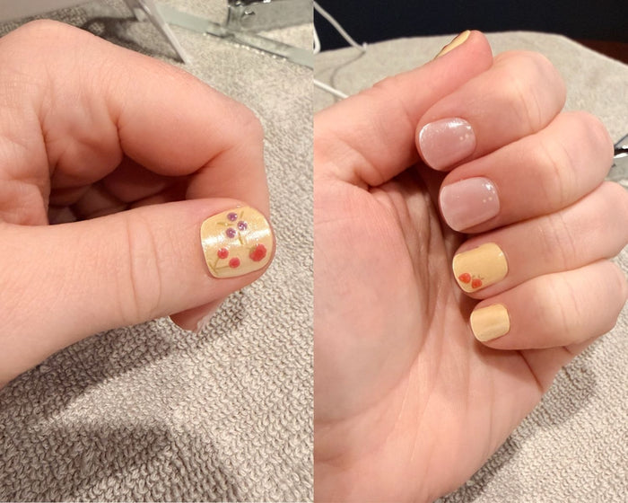 Mini Fruits nail decals layered over Pink Lemonade gel nail wraps