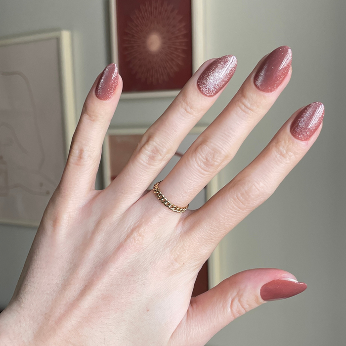 Neutral Velvet - Press-On | Medium | Almond showing hand with medium almond brown velvet cateye press-on manicure indoors