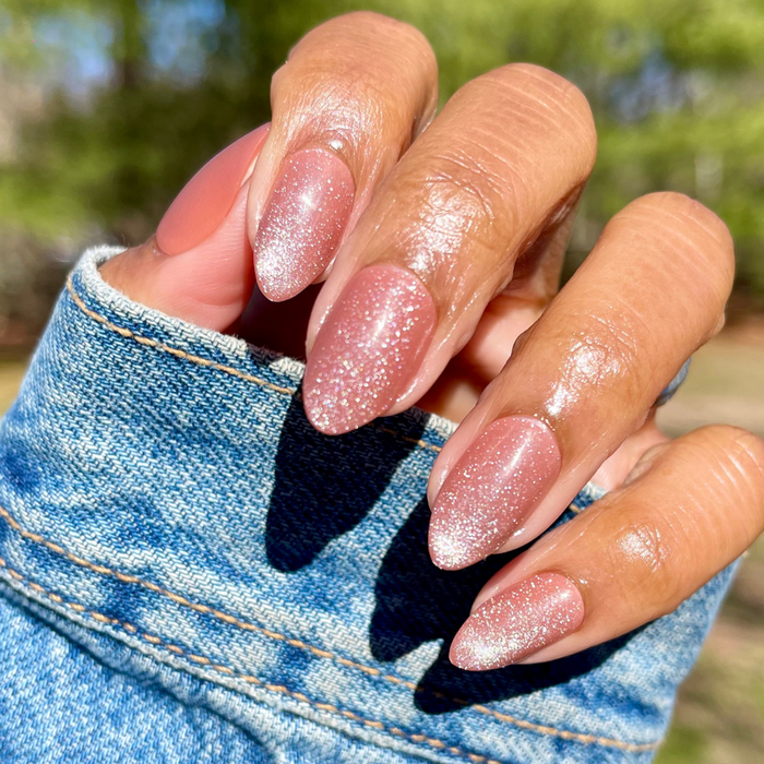 Neutral Velvet - Press-On | Medium | Almond showing hand with medium almond brown velvet cateye mani outdoors in sunlight