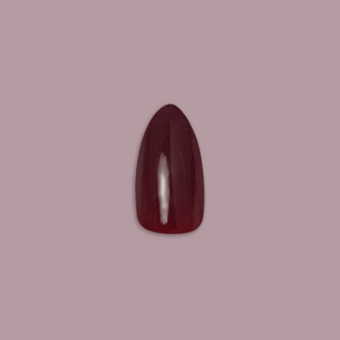 Obsessed - Press-On | Medium | Almond showing single dark ruby medium almond false nail on muted mauve background