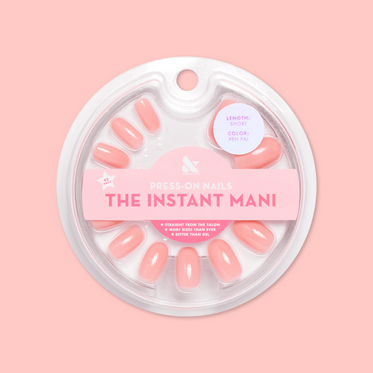 Pen Pal - Press-On | Short | Round showing short round bubblegum pink false nails in circular packaging on pink background