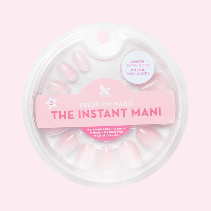 Pink Sands Jelly - Press-On | Extra Short | Squoval showing extra short squoval false nails in soft pastel pink jelly manicure