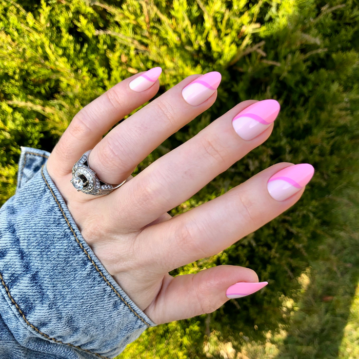 Pink Simple Twist - Press-On | Medium | Almond nails with soft pink tones and curved twist design for an easy at-home mani