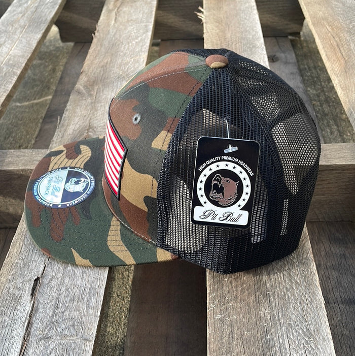 Camouflaged snapback cap with an embroidered American flag patch on the front and a Black mesh back. Side View