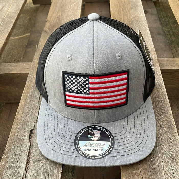 Heather Grey and Black snapback cap with an embroidered American flag patch on the front and a Black mesh back. Front View