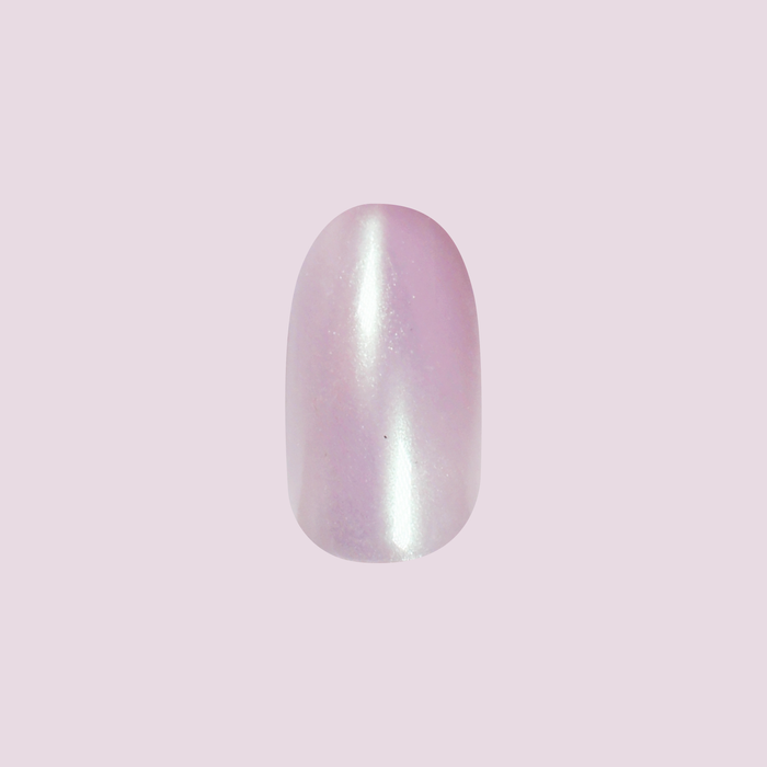 Purple Puka - Press-On | Medium | Oval showing iridescent lavender medium oval false nail for an easy at-home mani
