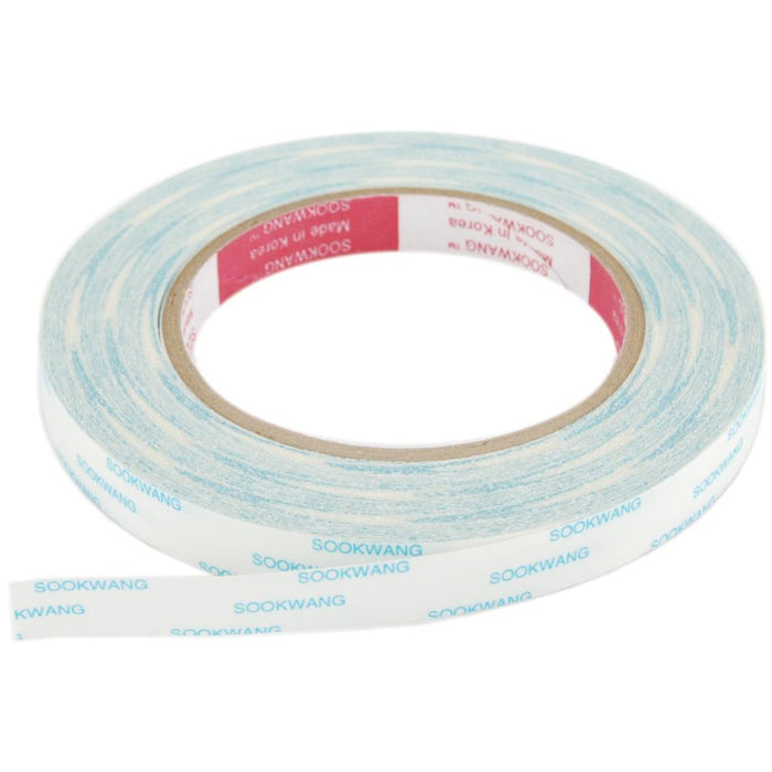 Scor-Tape - .5"X27yd. Premium double-sided adhesive that is perfect for cards, boxes, glitter, embossing, scrapbooking, foils, ribbon, origami, iris folding, micro beads, and much more! This tape is acid free and heat resistant. Available at Embellish Away located in Bowmanville Ontario Canada.