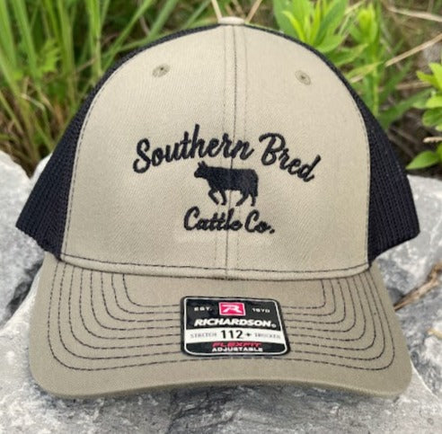 A Loden Green Southern Bred 'O.G.' Cattle Co. Richardson 112PL R-Flex adjustable snapback cap with a white logo and a mesh back.