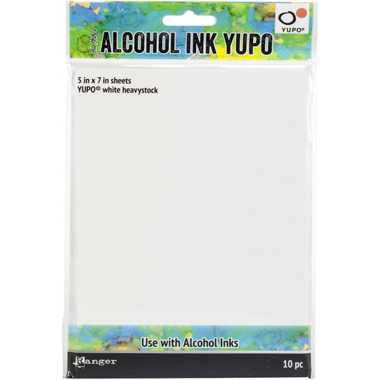 Ranger - Tim Holtz - Alcohol Ink White Yupo Paper - 144lb - 10/Pkg - 5"X7". YUPO is a versatile surface specially suited for watercolor & mixed media techniques using Tim Holtz Alcohol Inks, Mixatives, & Blending Solution. YUPO white heavy stock is a smooth, synthetic, ultra-heavyweight 144lb surface that resists buckling & dries quickly. Non-porous, water resistant surface. This package contains 10 5x7 sheets of white heavystock. Made in USA. Available at Embellish Away located in Bowmanville O