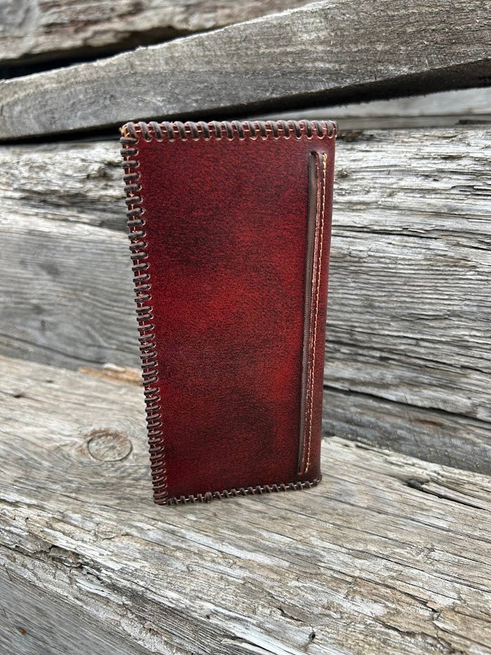 Brown leather checkbook wallet. Rear view showing a additional bill slot.