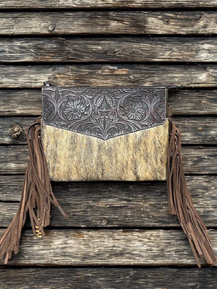 This Brown tooled leather and cowhide purse features a removable adjustable shoulder strap and a zippered closed concealed carry pocket on the rear. Inside it has six card slots and a zippered closed pocket. Front View C
