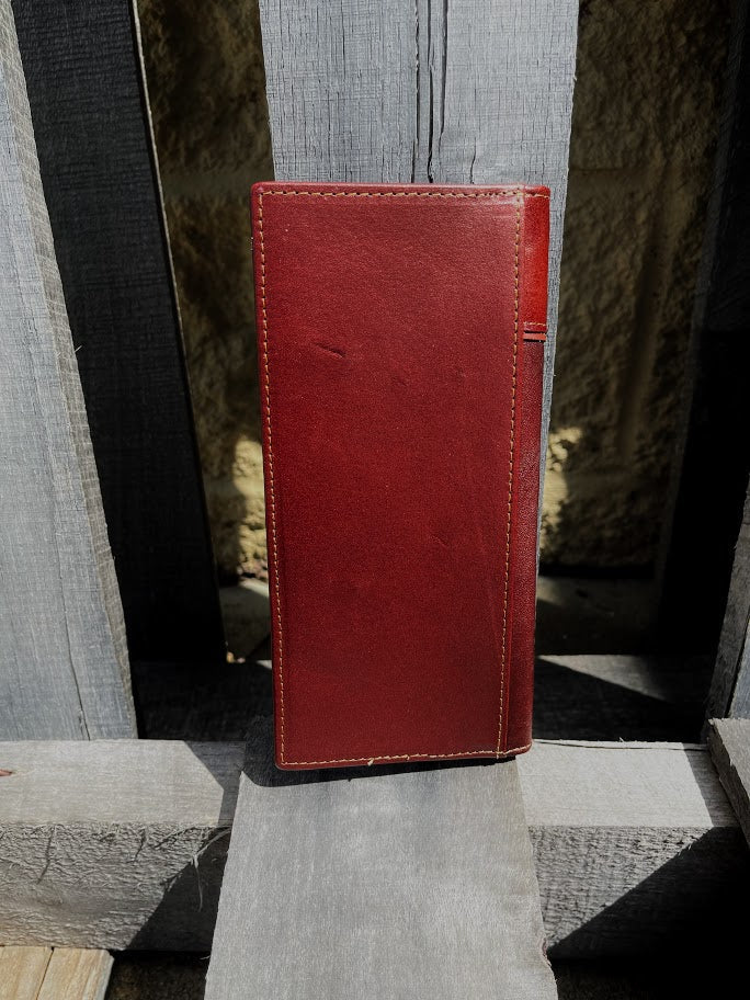 Brown leather tall wallet with a Brown inlay featuring a embossed Praying Cowboy design. Rear View