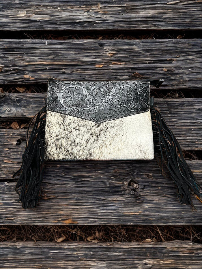 This Black tooled leather and cowhide purse features a removable adjustable shoulder strap and zippered close concealed carry pocket on the rear. Front View G