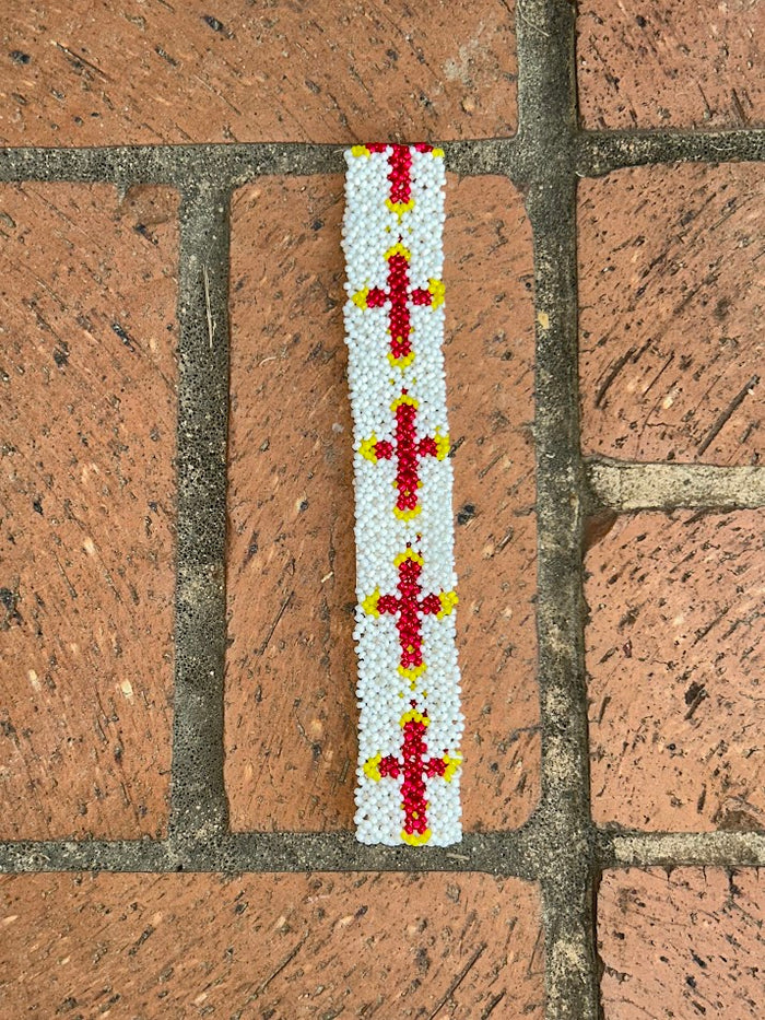 White beaded head or hat band with Red Crosses.