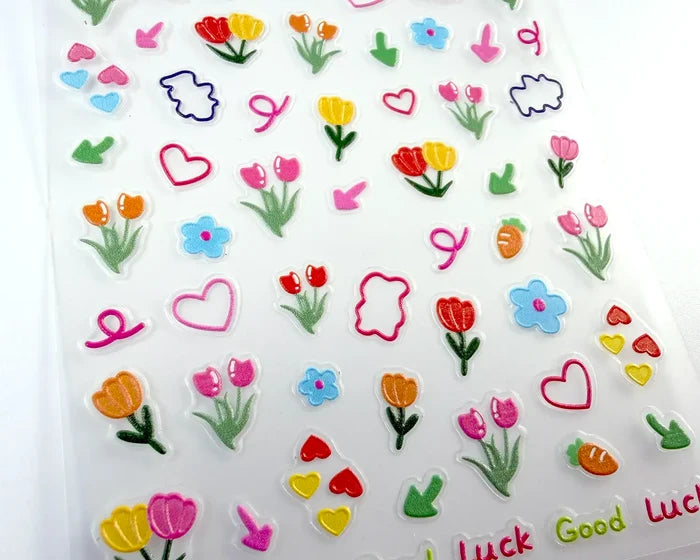Close-up of the hand drawn Tulip Garden nail decals