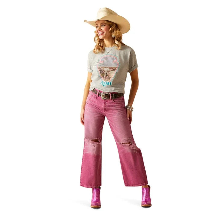 Women's Ariat Boyfriend fit Arrowhead graphic print T-Shirt in Heather Grey. This relaxed fit shirt features a graphic print on the front of a cow in the shape of an arrowhead with the Ariat logo. Full front view