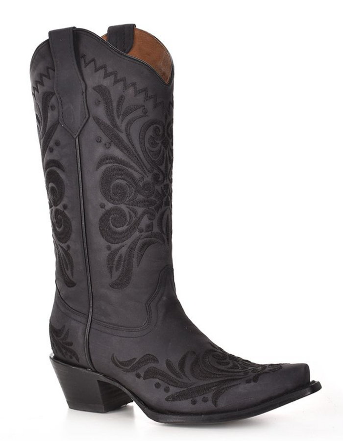 Profile view of a black snip toe western boot with embroidery stitching details.
